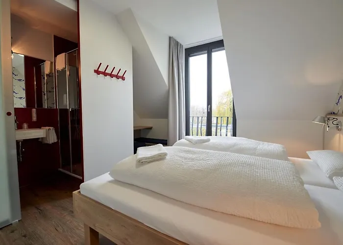 Radhotel Am Gleis 호텔 라돌프젤암보덴시